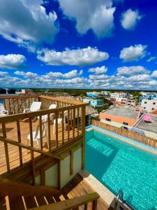 a view from the balcony of a resort with a swimming pool at Villa Iguana in Bayahibe