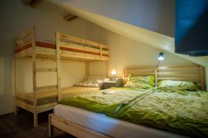 Postel nebo postele na pokoji v ubytování Apartmán Remedy