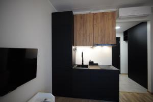 Kuchyň nebo kuchyňský kout v ubytování Riia Kvartal Apartment