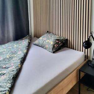 Łóżko lub łóżka w pokoju w obiekcie C53