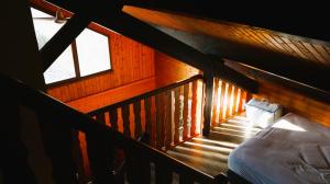 Łóżko lub łóżka w pokoju w obiekcie Chalet idéal 4-8 pers avec garage 20 mn Gérardmer