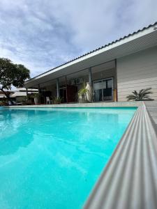 The swimming pool at or close to TEA TAHITI Holidays