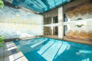 Bazén v ubytování Evident Hotel Prägant 4-Superior nebo v jeho okolí