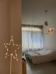 Posteľ alebo postele v izbe v ubytovaní Casa Mirabello