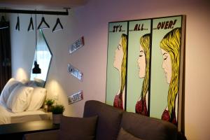A bed or beds in a room at Urban Living 4