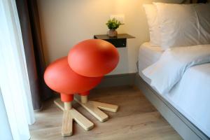 A bed or beds in a room at Urban Living 4
