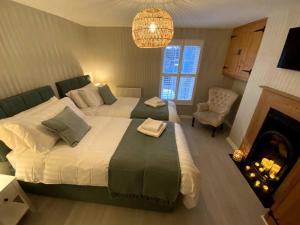 Voodi või voodid majutusasutuse The Lost Lobster - 2 bedroom cottage with parking toas