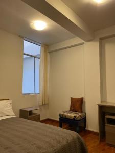 Ένα ή περισσότερα κρεβάτια σε δωμάτιο στο Hostal Sotillo