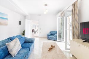 Μια τηλεόραση ή/και κέντρο ψυχαγωγίας στο 4You Luxury Apartments +62 φωτογραφίες