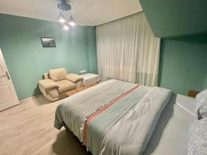 Postel nebo postele na pokoji v ubytování Ucal Apart