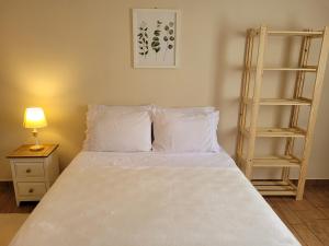 Katil atau katil-katil dalam bilik di Lumiar - Casa do Sol