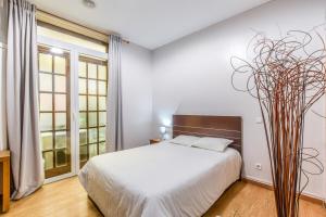 Postel nebo postele na pokoji v ubytování MyHouseSpain - Fuencarral and Gran Vía