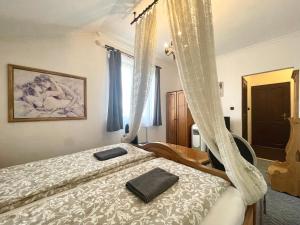 Posteľ alebo postele v izbe v ubytovaní Luxi Romantik Apartments