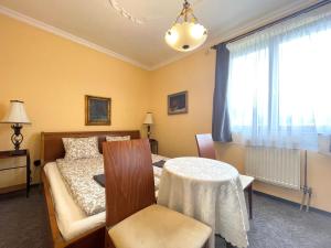 Posteľ alebo postele v izbe v ubytovaní Luxi Romantik Apartments