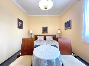 Posteľ alebo postele v izbe v ubytovaní Luxi Romantik Apartments