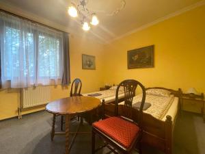 Posteľ alebo postele v izbe v ubytovaní Luxi Romantik Apartments