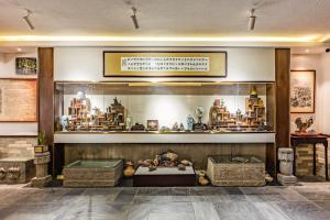 Зображення з фотогалереї помешкання Aroma Tea House Former Jing Guan Ming Lou Museum Hotel у місті Ґуйлінь