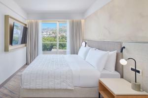 Postel nebo postele na pokoji v ubytování Le Meridien Lav Split