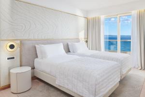 Postel nebo postele na pokoji v ubytování Le Meridien Lav Split