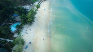 an aerial view of a beach with people on it at Tube Resort in Koh Rong Sanloem
