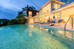 Fotografija v galeriji nastanitve Indulge in Your Dream Getaway at Gemini Villa 6 Bedrooms, Private Beach, and Yamu Pier Sea Views v mestu Phuket Town