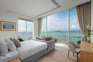 Fotografija v galeriji nastanitve Indulge in Your Dream Getaway at Gemini Villa 6 Bedrooms, Private Beach, and Yamu Pier Sea Views v mestu Phuket Town