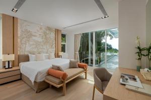 Fotografija v galeriji nastanitve Indulge in Your Dream Getaway at Gemini Villa 6 Bedrooms, Private Beach, and Yamu Pier Sea Views v mestu Phuket Town