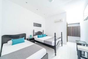 Postel nebo postele na pokoji v ubytování Hotel Mar di Plata + 75 fotografií