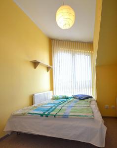 Postel nebo postele na pokoji v ubytování Apartament na Morenie Gdańsk