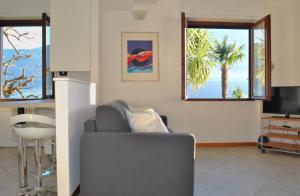 TV a/nebo společenská místnost v ubytování Apartment The Palm with Garden