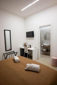 Ένα ή περισσότερα κρεβάτια σε δωμάτιο στο K-Home