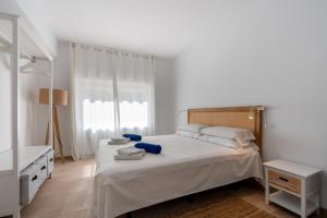 Ένα ή περισσότερα κρεβάτια σε δωμάτιο στο M4R Barcares Voramar I