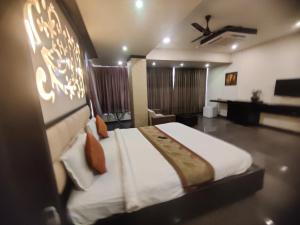 Voodi või voodid majutusasutuse HOTEL RESTANDVIEW toas