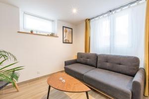 Część wypoczynkowa w obiekcie Calme absolu, terrasse et parking entre Paris et Disney