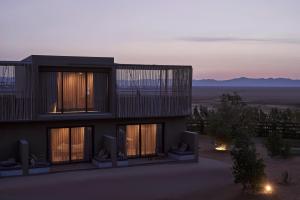 a rendering of a building with the sunset in the background at Casa Cook El Gouna - Adults Only in Hurghada