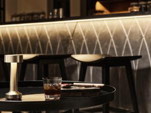 a drink sitting on a table in a bar at The Chedi El Gouna in Hurghada