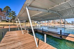 a dock with a boat ramp on the water at Stunning Seneca Home with Lake Keowee Access! in Seneca