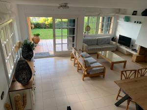TV a/nebo společenská místnost v ubytování Magnifique Villa avec vue mer 8 personnes