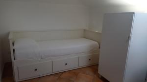 Postel nebo postele na pokoji v ubytování B&B Denteferro