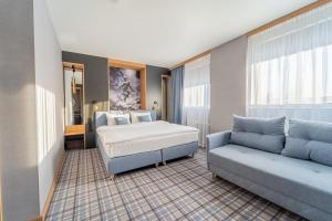 Łóżko lub łóżka w pokoju w obiekcie Hotel Polski