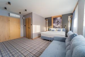 Łóżko lub łóżka w pokoju w obiekcie Hotel Polski
