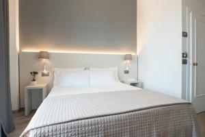 Кровать или кровати в номере Hotel Palace