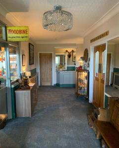 a room with a shop with a chandelier at The Headlands Hotel in Scarborough