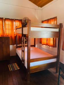 a couple of bunk beds in a room at Tanty’s Hostel in Galle