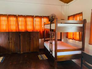 Postel nebo postele na pokoji v ubytování Tanty’s Hostel