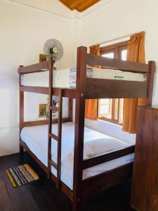 Postel nebo postele na pokoji v ubytování Tanty’s Hostel