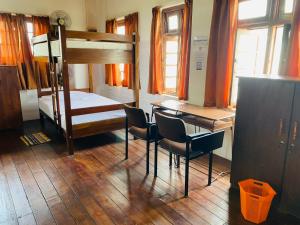 Postel nebo postele na pokoji v ubytování Tanty’s Hostel