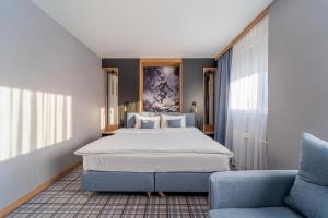 Łóżko lub łóżka w pokoju w obiekcie Hotel Polski