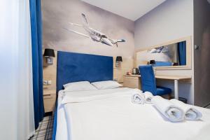 Łóżko lub łóżka w pokoju w obiekcie Hotel Polski