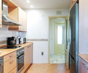 Kuchyňa alebo kuchynka v ubytovaní Miramar del Sol - Apartamento de 2 Dormitorios